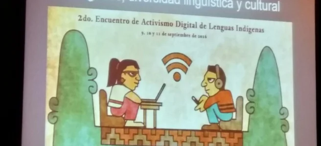 Foto de una presentación de diapositivas proyectada que muestra la ilustración de dos personas, una con un computador y otra con un celular, en un estilo que se asemaja al arte Azteca